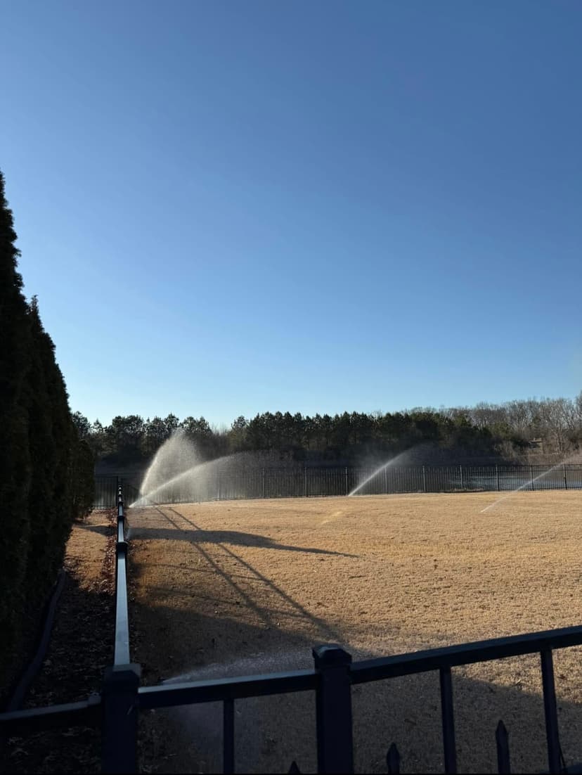 Sprinkler system running on a large property